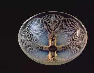 Coquilles, an opalescent glass vase moulded with overlying scallop shells by Lalique